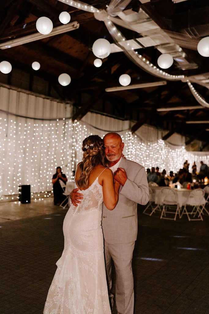 Bride dancing with father in Indiana wedding