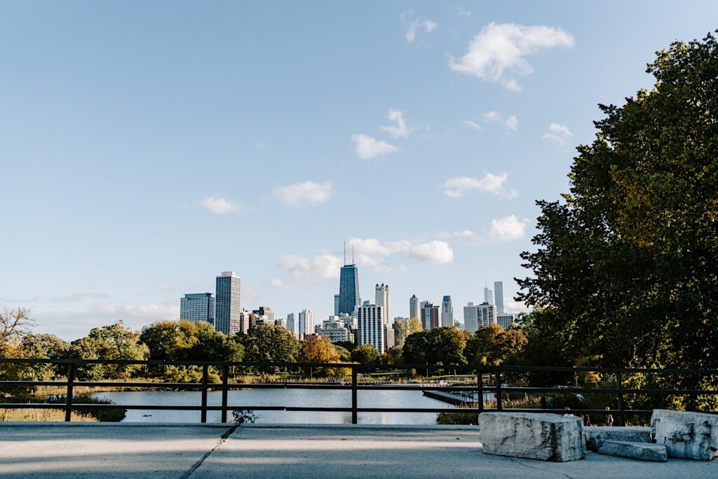 Photo taken of the Chicago skyline from a walking bridge in Lincoln Park