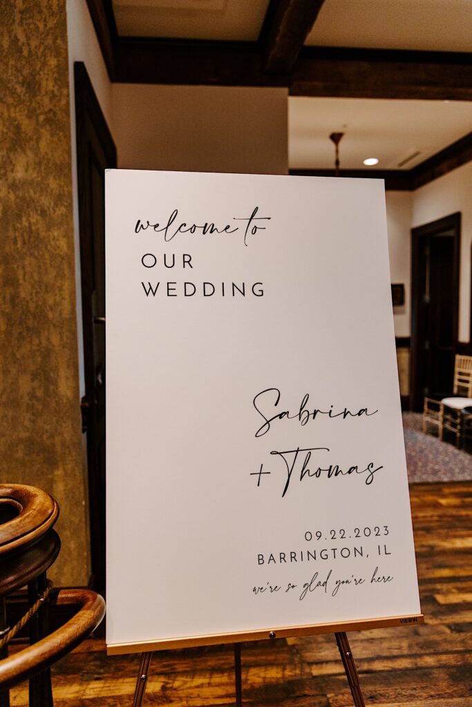 A welcome sign for an indoor wedding reception at the Makray Golf Club