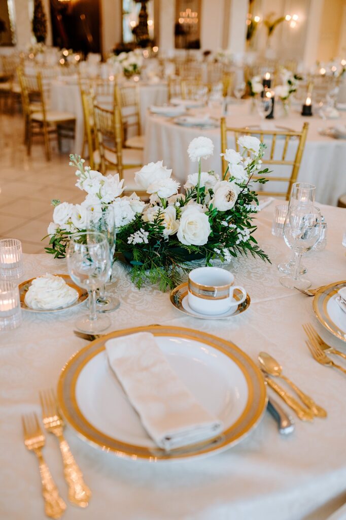 A table decorated and set up for a wedding reception