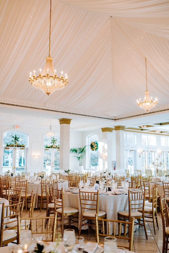 The indoor receptions space of The Haley Mansion decorated for a wedding reception